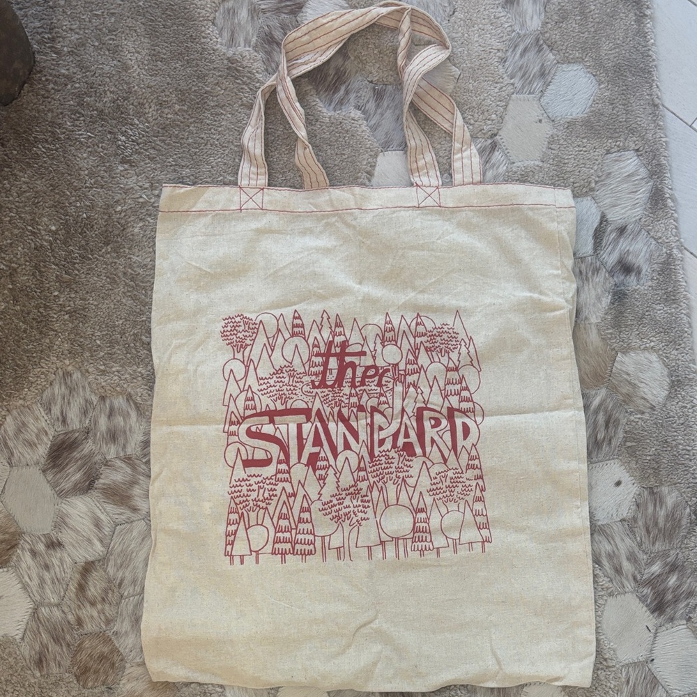 The Standard Hotel Beige Tote Bag with Red Graphic